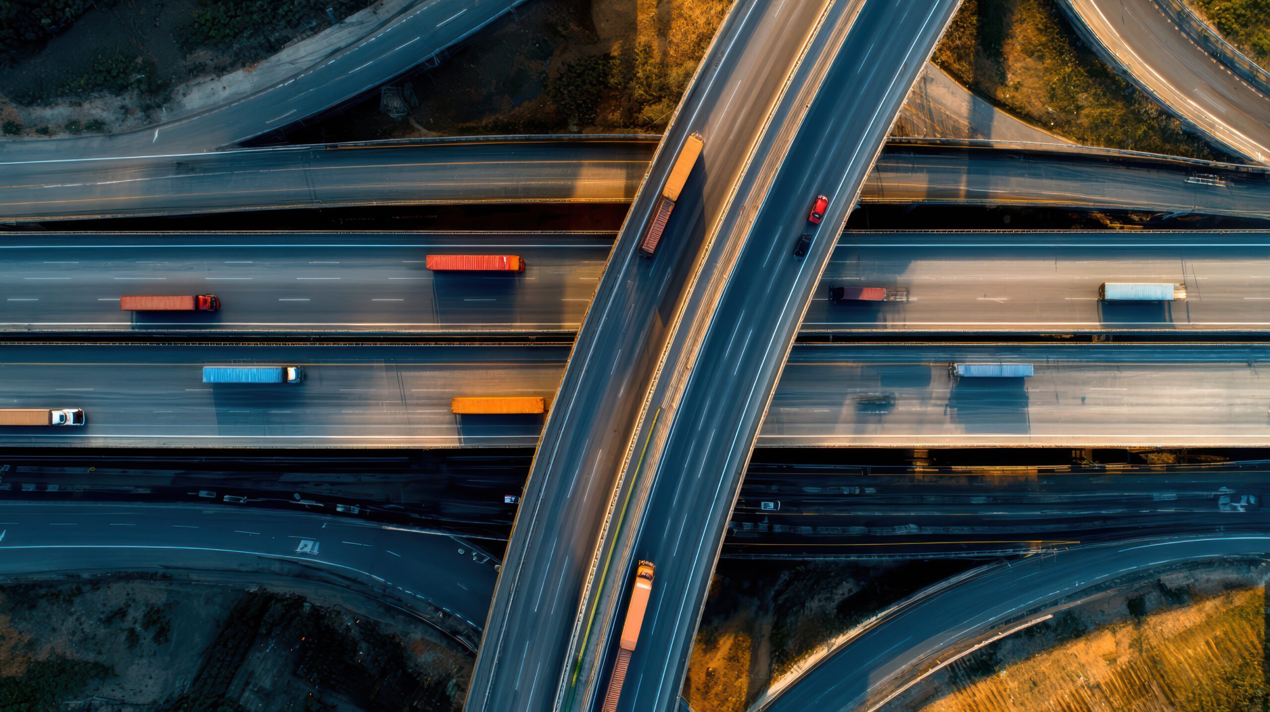 aerial-view-busy-highway-interchange-with-trucks (1)
